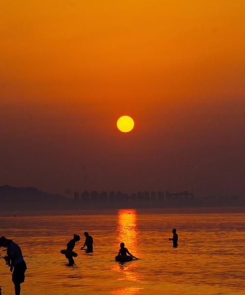 海边日落怎么拍,夏天傍晚的落日图4